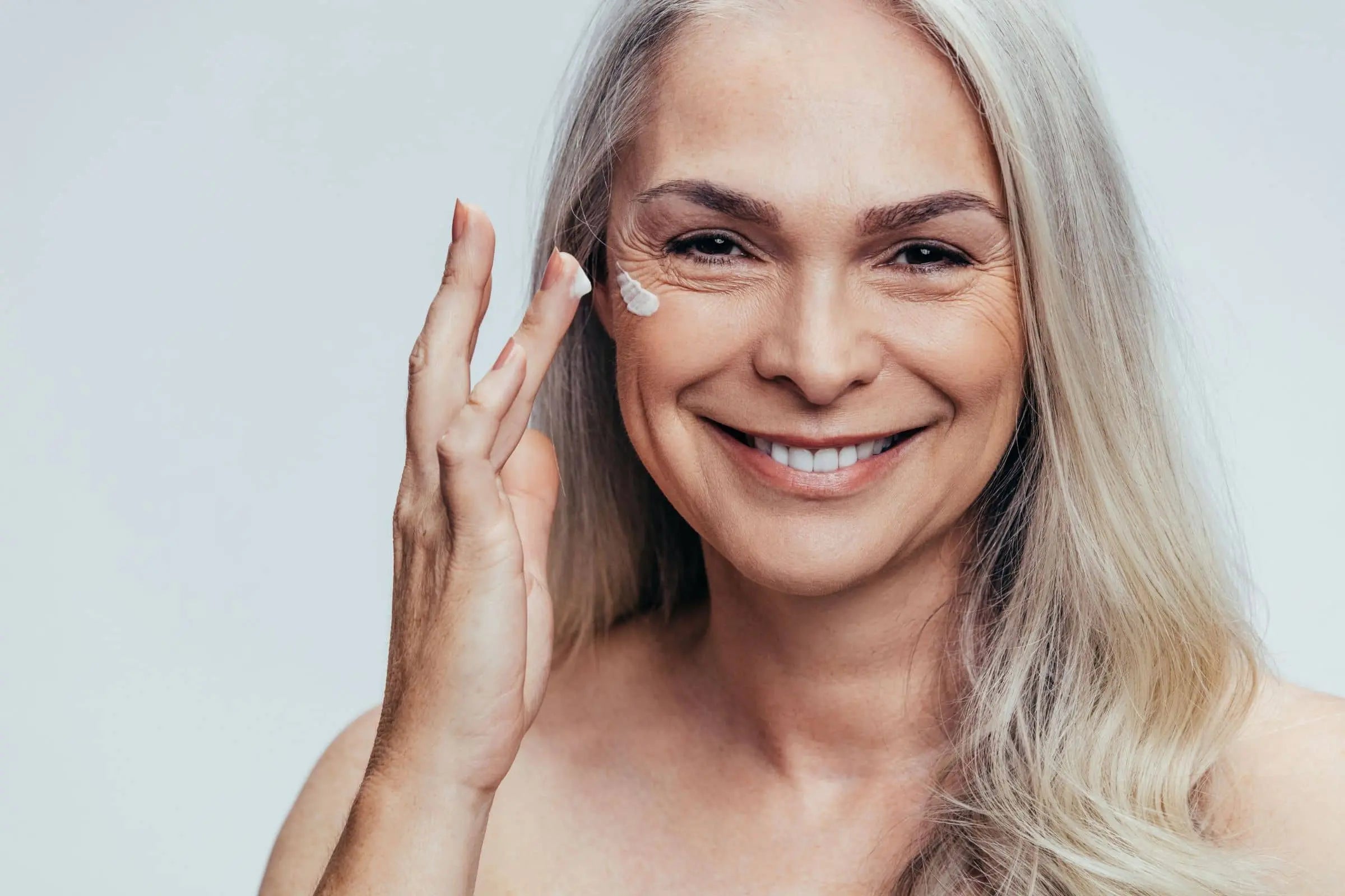 Older woman with clear and smooth youthful skin